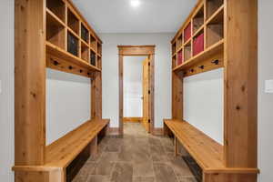 Mudroom featuring baseboards