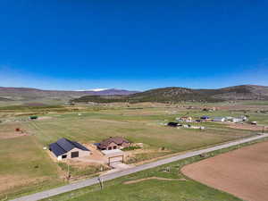Drone / aerial view featuring a rural view and a mountain view