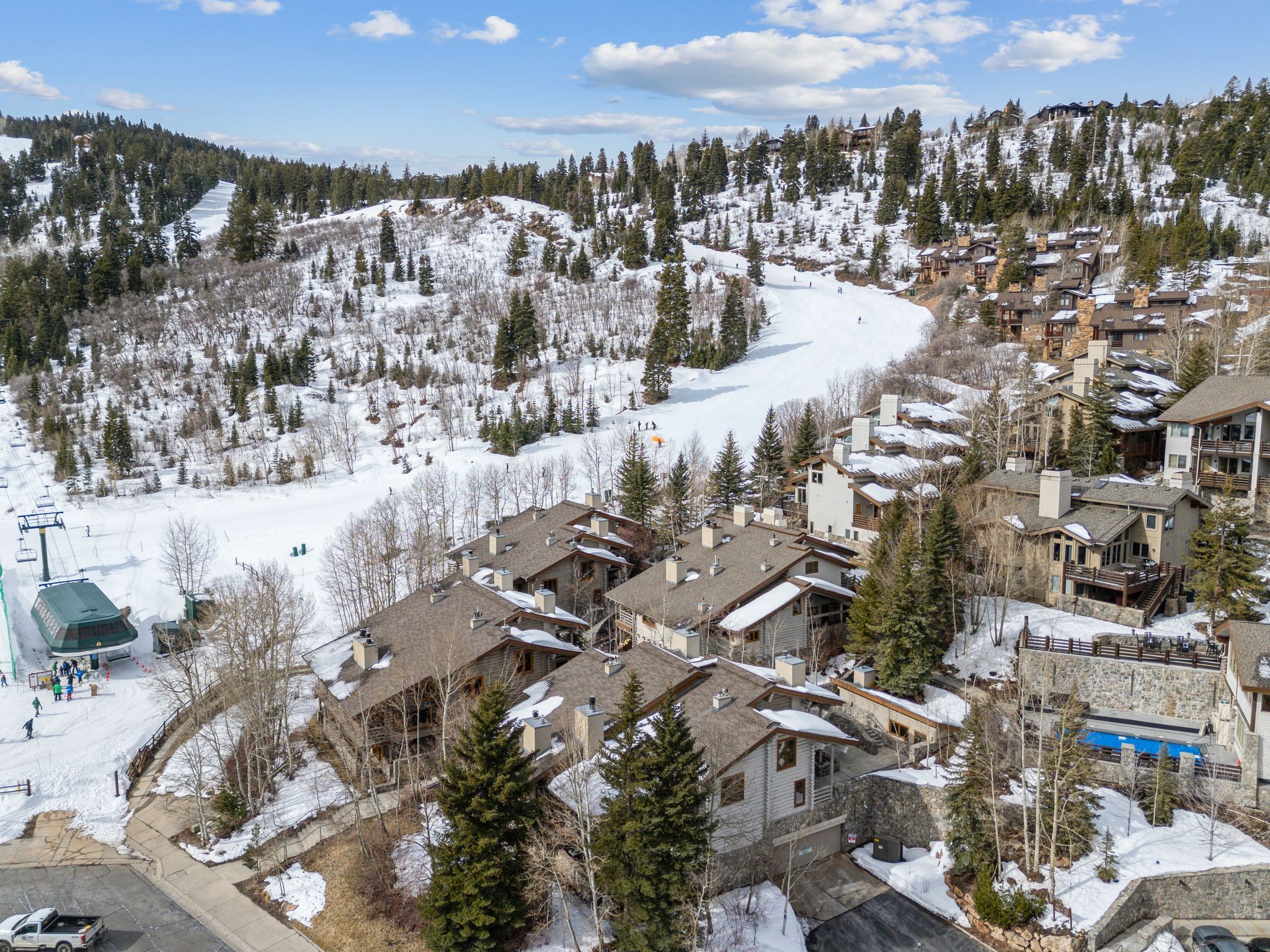 Snowy aerial view featuring a residential view