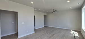 Unfurnished bedroom with visible vents, recessed lighting, ceiling fan, baseboards, and light wood-style floors