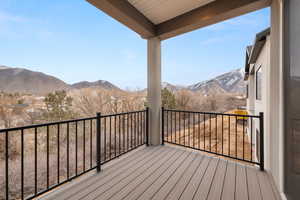 Wooden deck featuring a mountain view