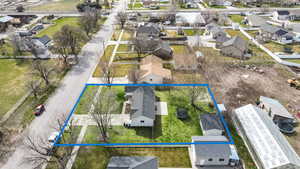 Birds eye view of property with a residential view