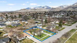 Drone / aerial view featuring a residential view and a mountain view