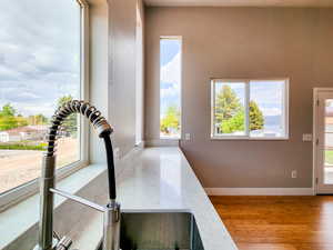 Interior details with wood finished floors and baseboards
