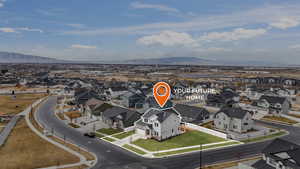 Bird's eye view with a residential view and a mountain view