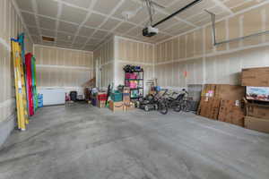 Garage featuring a garage door opener