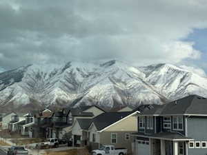 Property view of mountains featuring a residential view