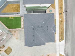 Aerial view of roof, for reference- the front which faces east is located toward at the bottom of the photo, the turf field is to the south, and the street is on the north side of property