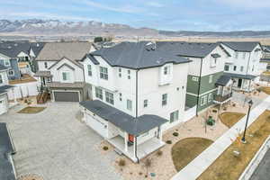Drone / aerial view featuring a sidewalk view and driveway view