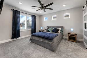 Master Bedroom with recessed lighting, upgraded windows, large plantation shutters, large baseboards, top tier ceiling, integrated ceiling speakers
