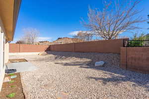 View of yard with a patio area and a fenced backyard