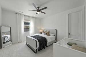 Bedroom with visible vents, light carpet, baseboards, and ceiling fan