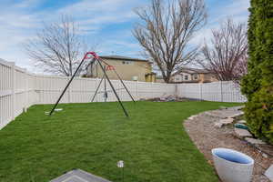 View of yard featuring a fenced backyard
