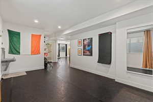 Unfurnished room featuring recessed lighting and baseboards