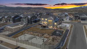 Drone / aerial view featuring a mountain view and a residential view
