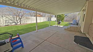 View of patio / terrace with a fenced backyard