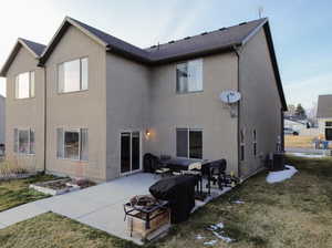 Back of house featuring a patio area, a park.