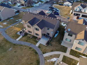 Birds eye view of property with a residential view