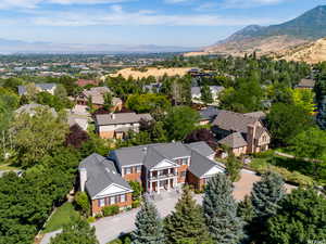 Drone / aerial view featuring a residential view and a mountain view