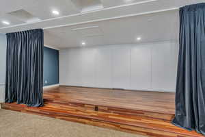 Professional performance stage with lighting and curtain.