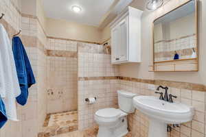 Basement bathroom with convenient laundry