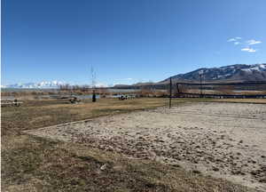 View of yard featuring volleyball court and a mountain view