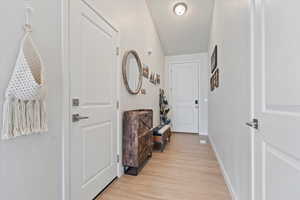 Interior space with light wood-style flooring and baseboards