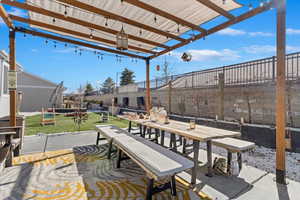 View of patio / terrace featuring outdoor dining area and fence