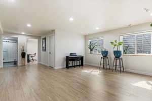 Interior space featuring recessed lighting, baseboards, and light wood-style floors