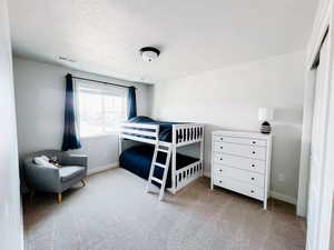 Bedroom 3 with carpet floors