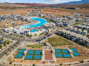 Bird's eye view of a mountain backdrop and a pool area