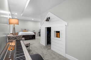Carpeted bedroom featuring recessed lighting and baseboards