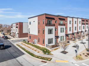 View of building exterior with a residential view