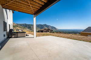 View of patio / terrace with a mountain view
