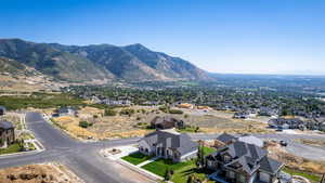 Exterior space featuring a residential view and a mountain view