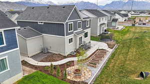 Drone / aerial view featuring a mountain view and a residential view