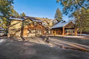 View of front facade with an attached garage and driveway