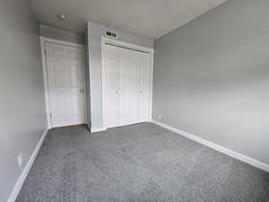 2nd bedroom featuring a large closet and east facing light.
