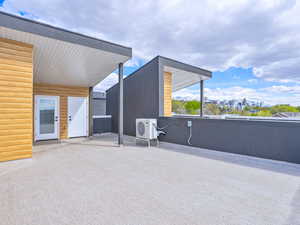 View of patio featuring ac unit