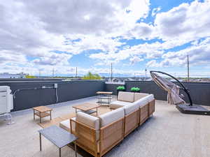 View of patio with an outdoor living space