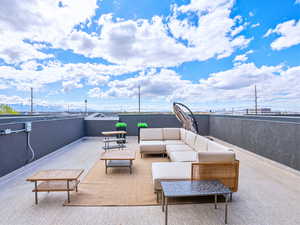 View of patio with outdoor lounge area