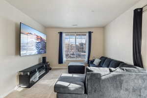 Carpeted living area f