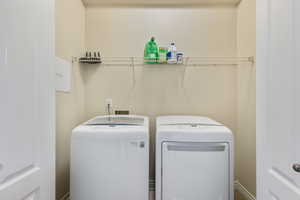 Laundry room featuring washer and dryer