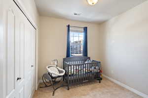 Bedroom #2 featuring carpeted floors