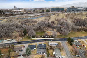 Birds eye view of property with a mountain view