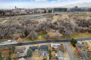 Birds eye view of property with a mountain view