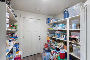 Pantry featuring visible vents