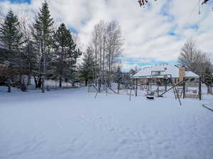 View of large yard and west end fenced garden plot