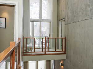 View loft and covered deck off of Bedroom 1