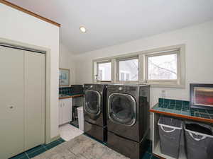 Sink and storage space in laundry roomenjoy the outside view while doing laundry